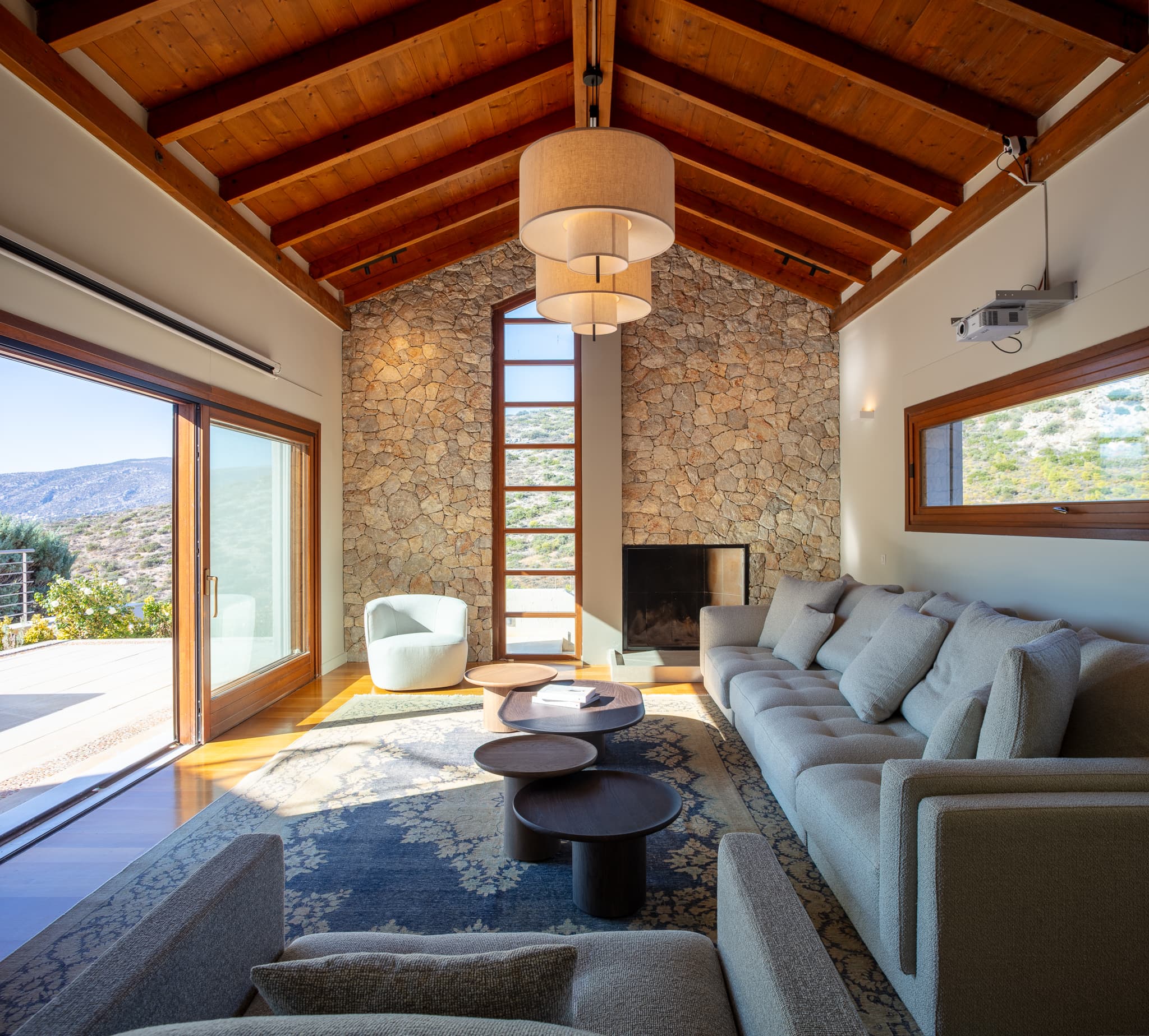 Fireplace lounge with wooden ceiling
